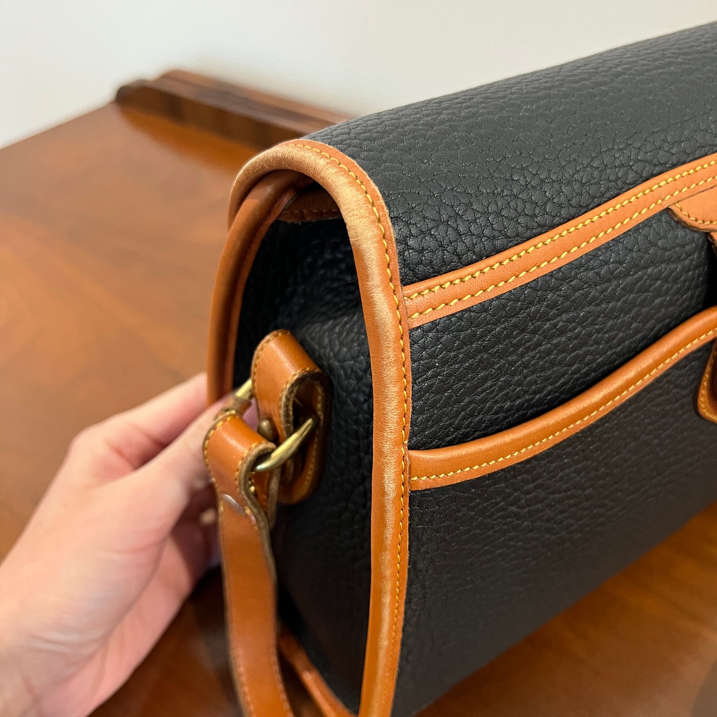 Vintage 1990s Dooney & Bourke All Weather Leather Medium Essex Bag in Black with British Tan Trim