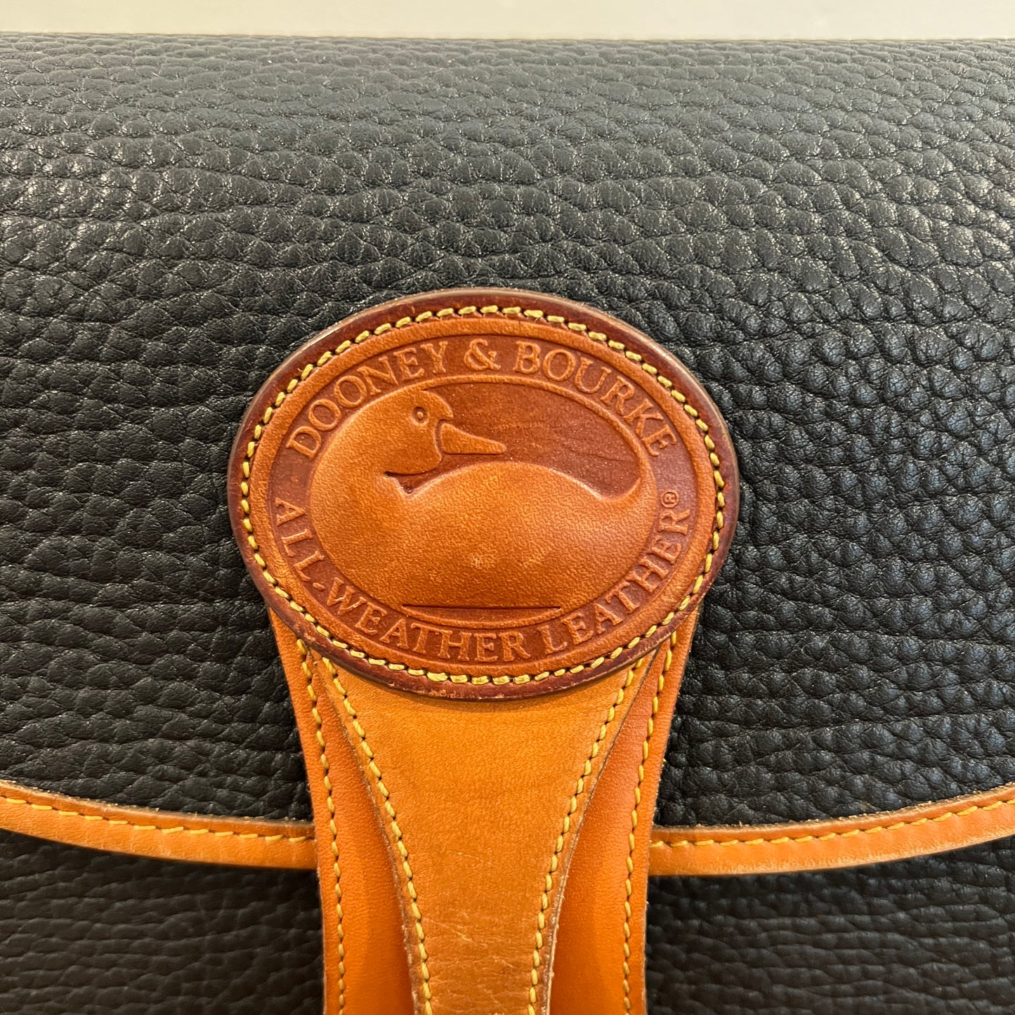 Vintage 1990s Dooney & Bourke All Weather Leather Medium Essex Bag in Black with British Tan Trim